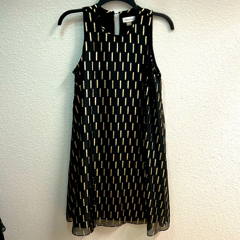 Calvin Klein black and gold sleeveless dress.  Never worn but tags removed.